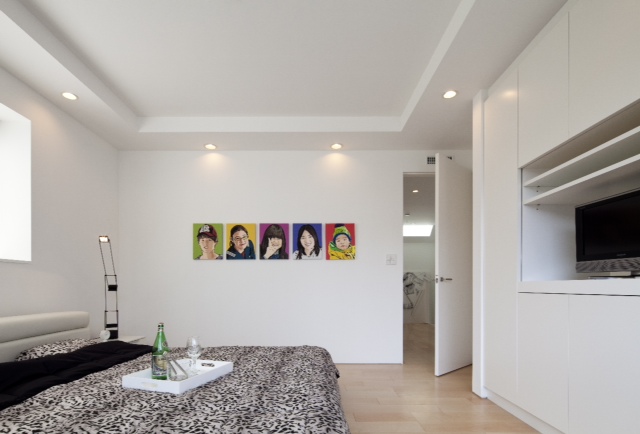 Small bedroom with white walls