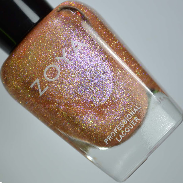 rose gold holographic nail polish in a bottle