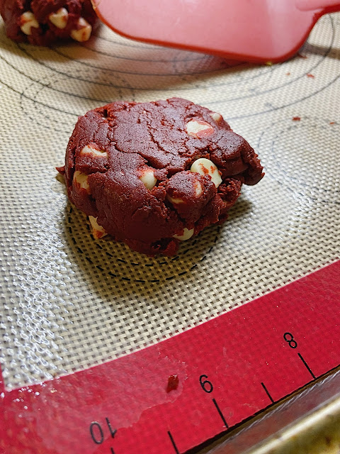 Red Velvet cookie dough on baking sheet