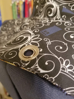 Close up of the TARDIS filigree side of the hat displaying the grommet.