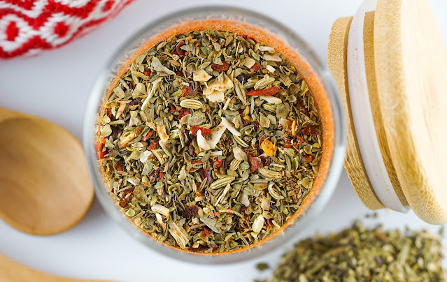 pizza seasoning in a clear glass jar.