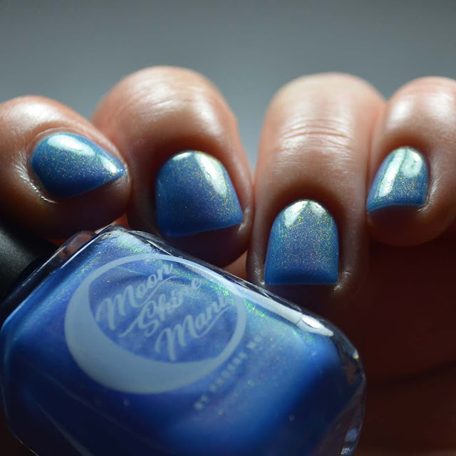 neon blue nail polish with color shifting shimmer