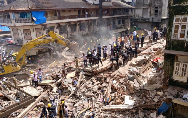 Building collapses in India's Mumbai; nine dead, some trapped