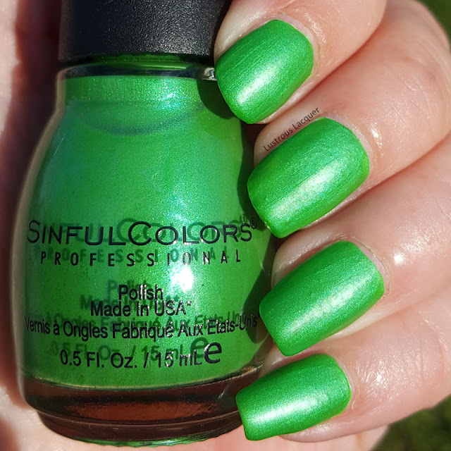 Grass green neon nail polish with bright green shimmer.