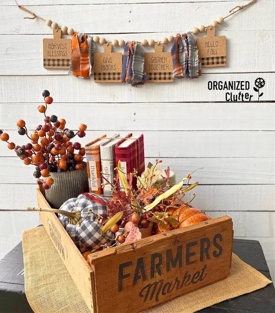 Photo of a DIY fall banner & fall season crate vignette.