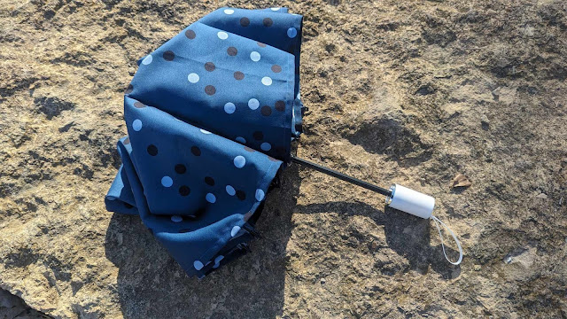 Recovering an umbrella with new fabric