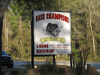 Click to enlarge - The sign out front you have to watch for to find Bass Champions.