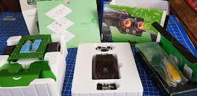 Robobloq Q-scout Robot box contents laid out on the table 3 layers of items