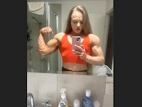 Female bodybuilder with huge biceps