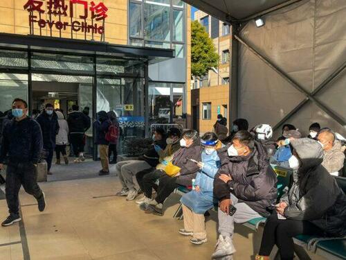 People wait for medical attention at the fever clinic area in Tongren Hospital in the Changning district in Shanghai, on Dec. 23, 2022. (Hector Retamal/AFP via Getty Images)