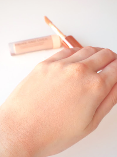 Blended out swatch of the Makeup Revolution Prime & Lock Longwear Eyeshadow Primer on back of hand, giving a warm toned coverage, that appears thick - though it was a thick swatch of product.