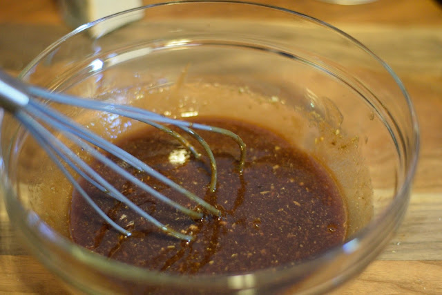 The glaze for the steakhouse meatloaf mixed together in a bowl.