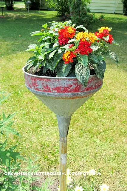 Junk Garden Funnels www.organizedclutterqueen.blogspot.com