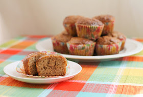 Food Lust People Love: Peanut butter stuffed banana muffins are baked with our favorite banana batter filled with a good teaspoon of peanut butter each, then dipped in a sweet peanut butter glaze. These guys are a special treat for breakfast, snack time or even dessert.