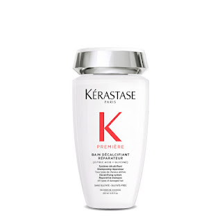 Image of Kérastase Bain Decalcifiant Repairing Shampoo, a luxurious shampoo that repairs and strengthens damaged hair.