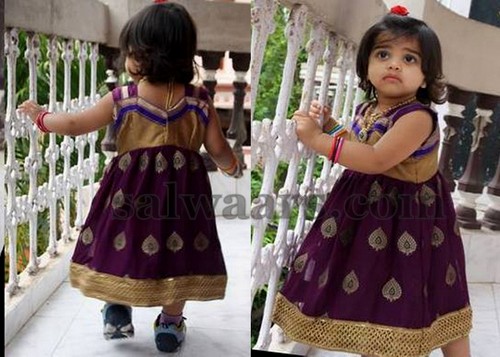 Baby in Purple Color Frock