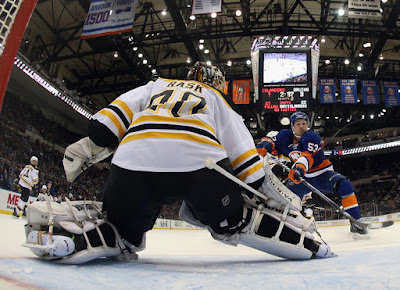 Tuukka Rask makes a save against the Islanders