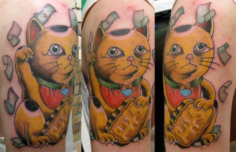 Maneki Neko tattoo. Mister Steve Byrne gave me a new tattoo this weekend.