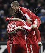 Mario Gomez of FC Bayern Muenchen celebrates with team mates after scoring a . (jayson )