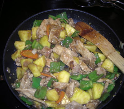 Pork and pineapple with chiles, garlic, and ginger