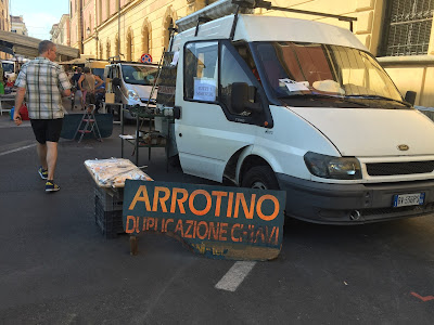 Left: Knife Grinder at the Cuneo Market