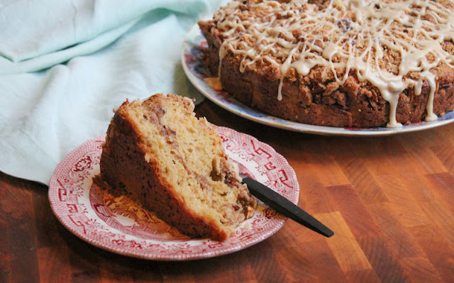 Food Lust People Love: Crunchy streusel sweetened with brown sugar and maple syrup bakes inside and on top this maple coffee cake. It’s finished with a sweet maple syrup glaze for a perfect seasonal treat.