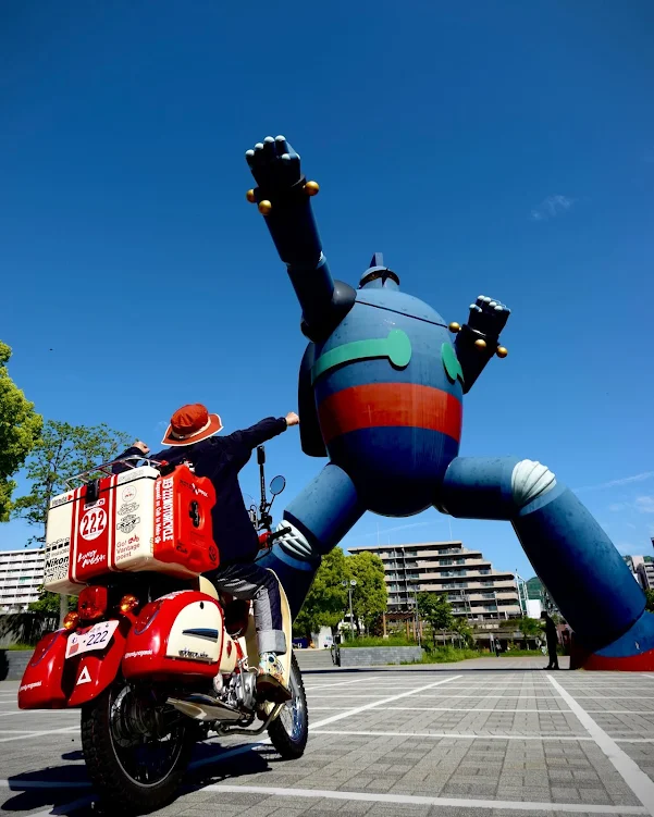 Mercenary Garage Custom Motorcycle Workshop Honda Cub with Tetsujin 28 Robot Giant Sculpture Kobe Japan by Handy Nagasaki
