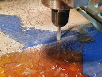 Cutting away excess epoxy resin