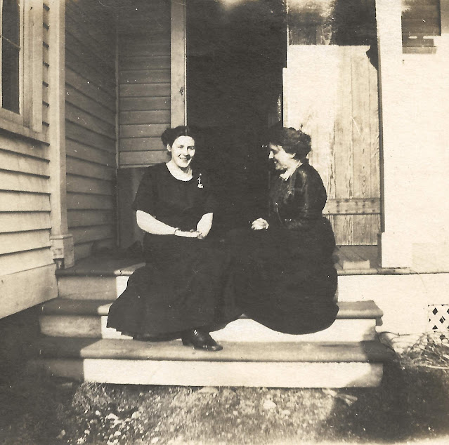 Two unknown people at 306 Maple St house in Housatonic, MA, abt 1919