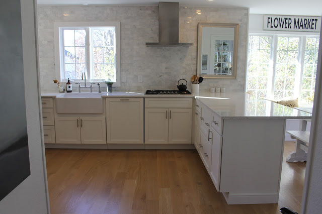 hello-lovely-studio-fixer-upper-white-kitchen-spare-farmhouse-table