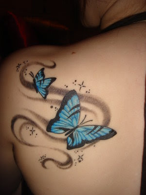 butterfly tattoo on shoulder. nice butterfly tattoo designs for women with dark skin color,