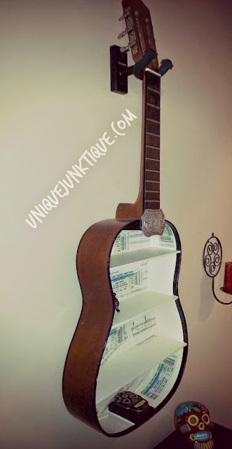 upcycled guiter shelf by unique junktique