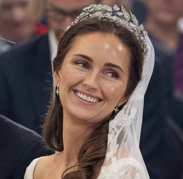 Princess Sophie-Alexandra wears a Bavaria diadem, and a wedding dress. Prince Alois and Princess Sophie