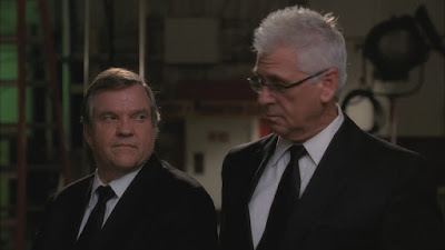 Meatloaf and Barry Bostwick as the executives