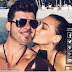 Have April Love Geary, 21, and Robin Thicke, 39, got married? model pointers at secret nuptials as she sports activities personalised bikini in the course of romantic getaway