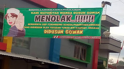 spanduk penolakan warga dan aparat dusun gowak