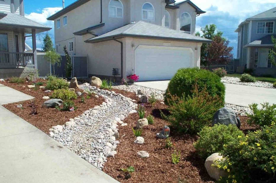 Grass be gone: an example of full xeriscaping, where all turf grass 
