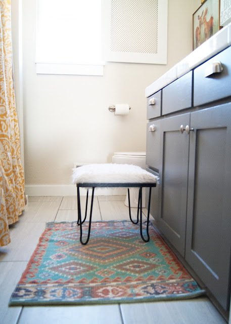 Bathroom Makeover - before & after - World Market rug / mat and vintage hairpin leg stool 