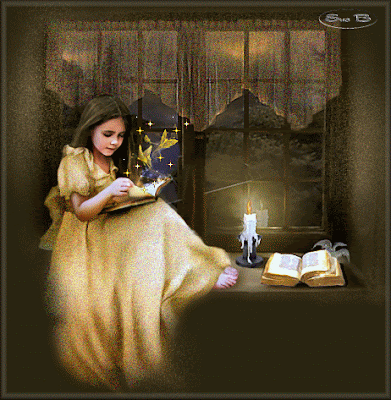 Lovely girl reading a book in candle light