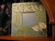 The leaves were cut out from flocked wallpaper and add a lovely texture to . (dream frame)