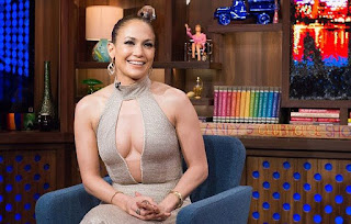 Jennifer Lopez, 46, attended the Watch What Happens Live on Monday, February 29, 2016, wearing a plunging dress with swept up hair and ankle strap heels and she totally knocked our socks off.