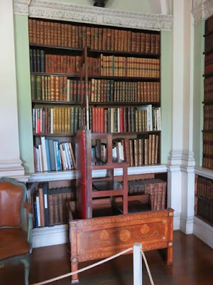 library stairs before bookshelf