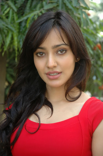 Neha Sharma looking sexy in red dress