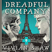 Dreadful Company audiobook cover. A blonde woman holds up a skull. Behind them the Paris skyline is visible on a turquoise backdrop.