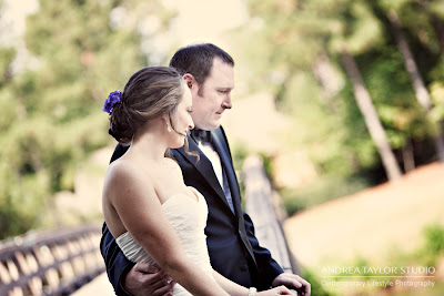 bride and groom posing together after first look