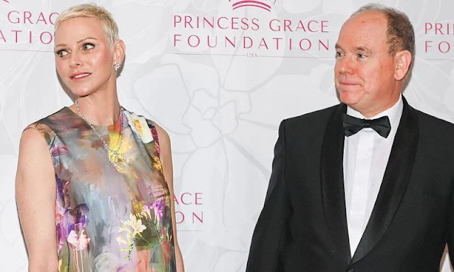 Princess Charlene wore a new Terrence Bray Dress, which featured a beautiful floral design all over the gown. Dior diamond earrings