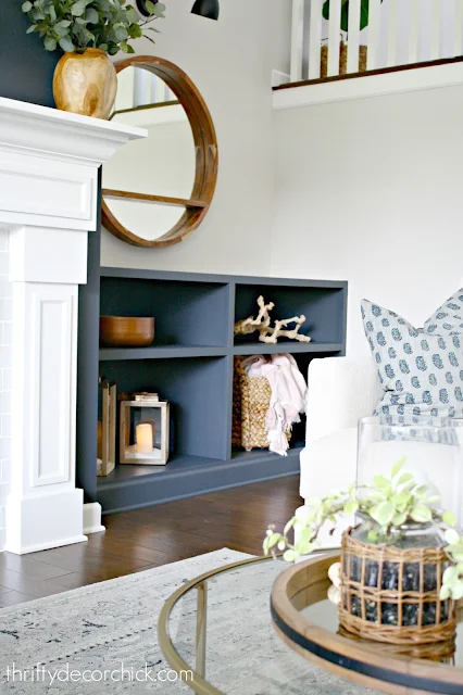 Dark fireplace walls, dark built ins