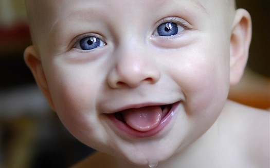 Cute & Smiling Blue Eye Baby Photo