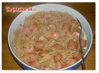 Spaghetti with "pierced" sausages