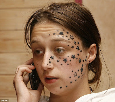  Teenager is suing a tattoo artist for tattoing 56 stars on her face.